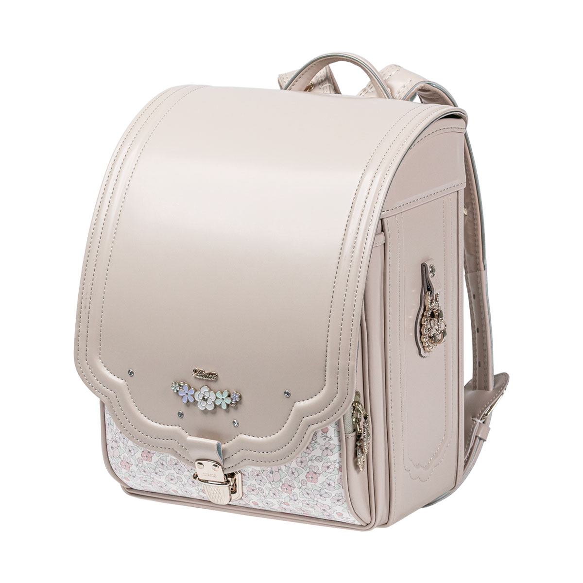 ランドセル ロメリア クリームアイボリー 半かぶせタイプ リリコ 花びらの形のかぶせ 花々と輝くストーンの調べが奏でる可憐な女の子ランドセル