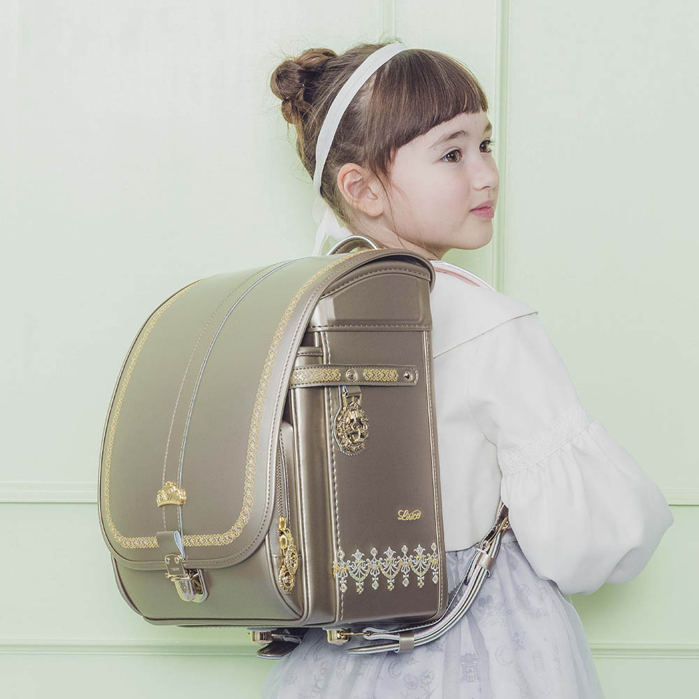 ランドセル ジュエル シルキーゴールド 半かぶせタイプ リリコ きらめくジュエリーをまとったような気品あるエレガントな女の子ランドセル