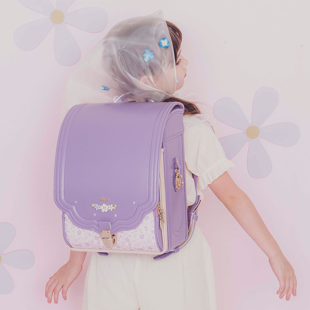 ランドセル ロメリア ビオラ 半かぶせタイプ リリコ 花びらの形のかぶせ 花々と輝くストーンの調べが奏でる可憐な女の子ランドセル